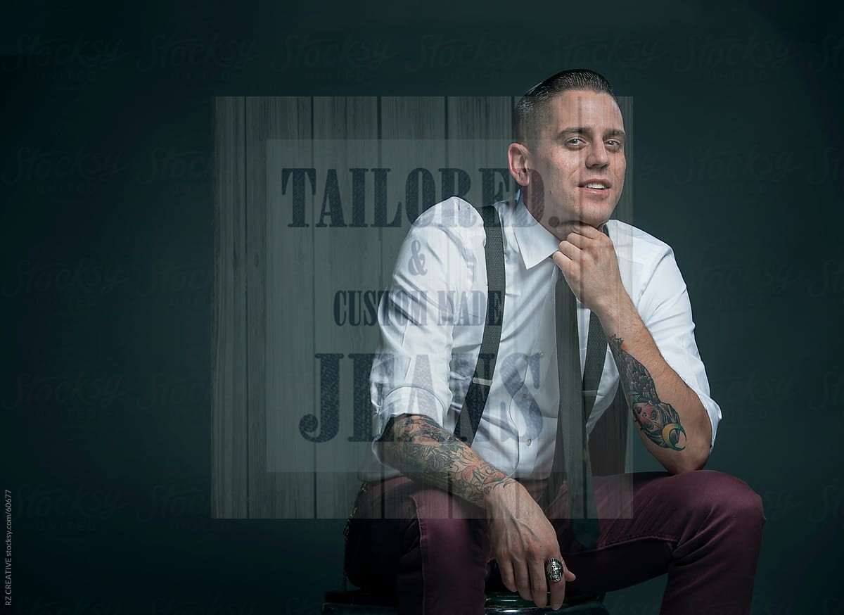 A customized look and customized jeans with braces (suspenders).