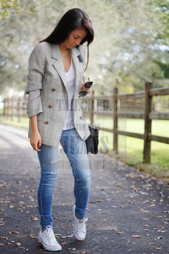 ripped jeans a white top a grey checked blazer and white Converse