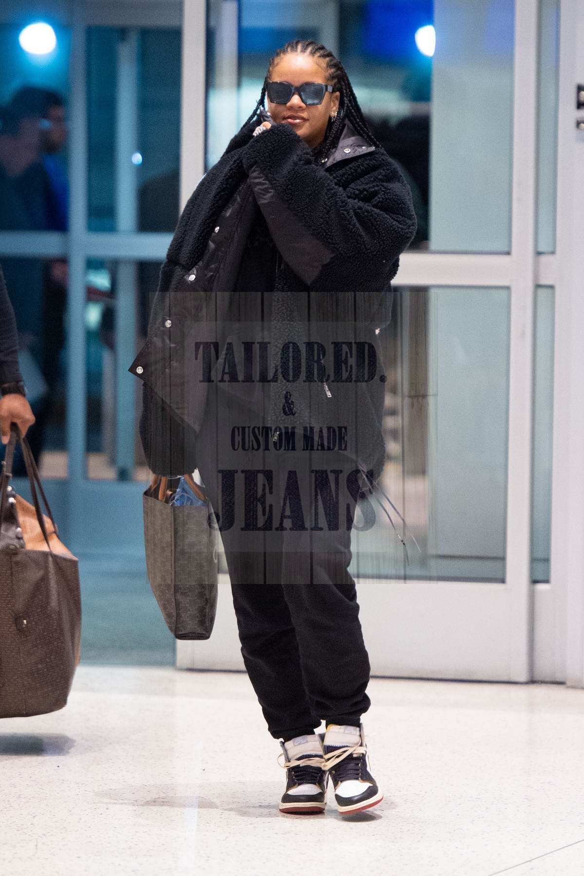 rihanna looks trendy in all black ensemble as she arrives at jfk airport in new york city
