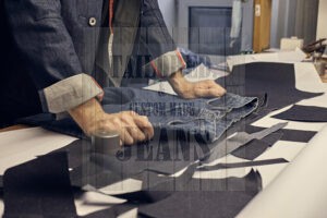 cropped tailor makes measurements jeans with meter sewing workshop